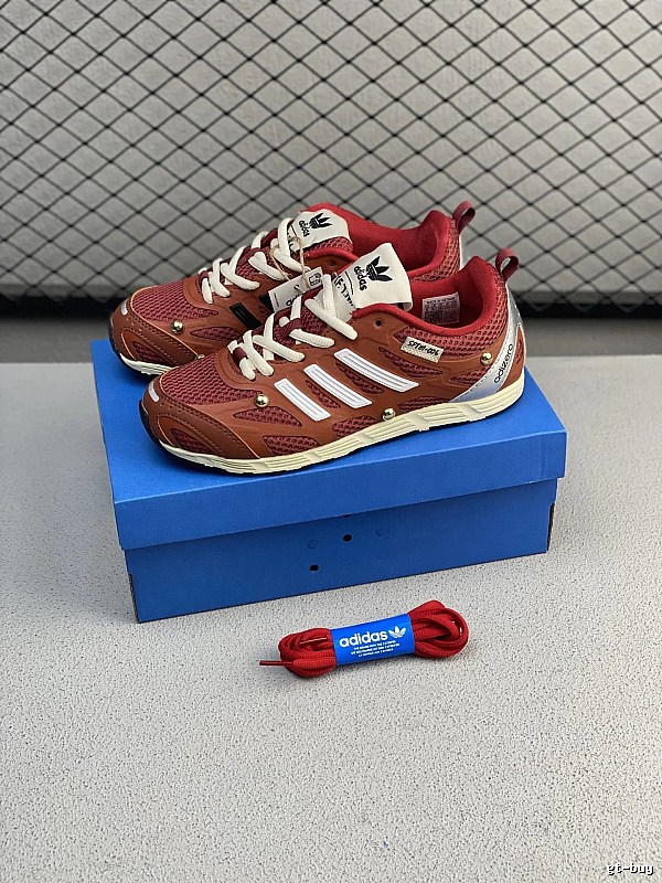Adidas Chunky Runners with Raised Heel Cushioning in Rust Brown