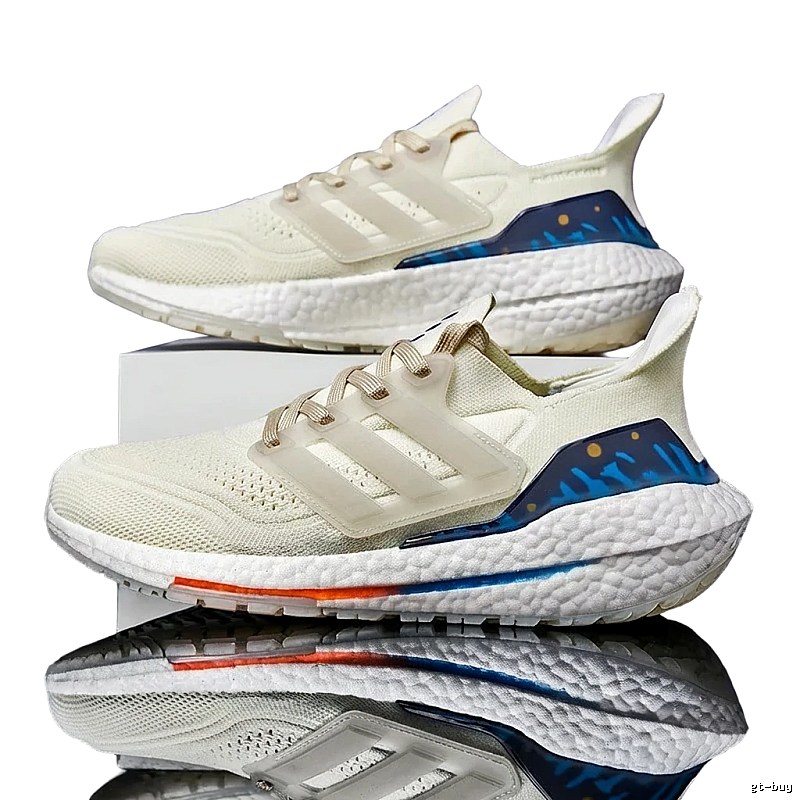 Adidas retro-style white and blue sports shoes