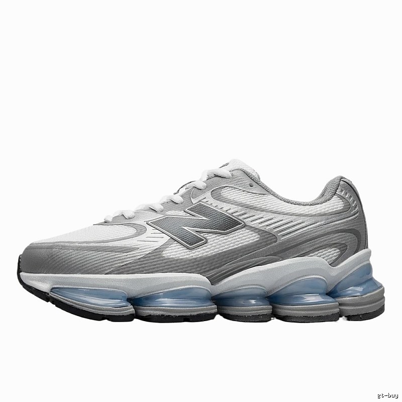 New Balance retro-style silver and white sports shoes