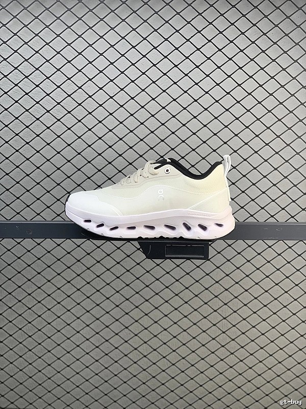 On Cloud Runners in White and Black, Finished with Layered Mesh Upper