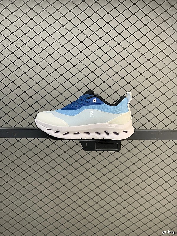 On White and Blue Cloud Runners Highlighting Open Mesh Panels
