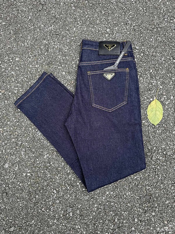 Prada Dark Indigo Logo Jeans with triangle badge hardware and contrast pocket stitching