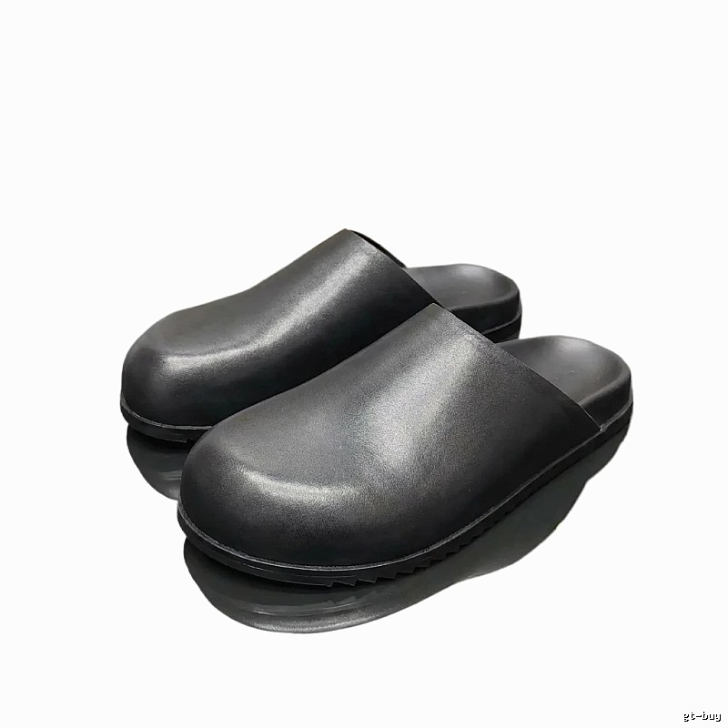 Rick Owens' dark style black slippers