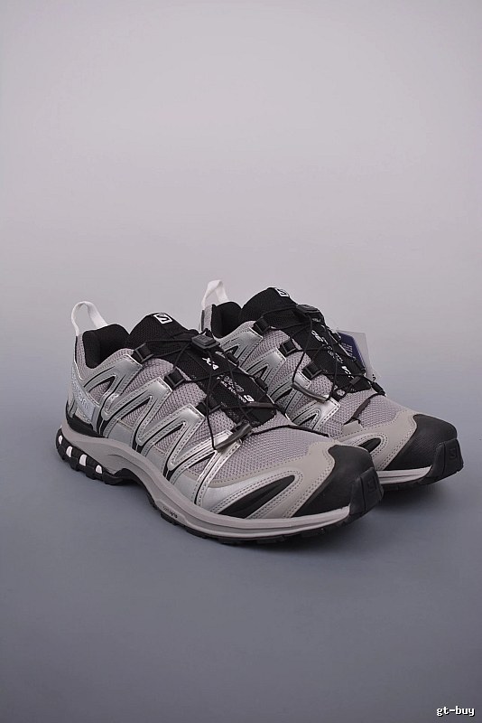 Salomon Gray and Black Trail Runners Highlighting Treaded Trail Sole