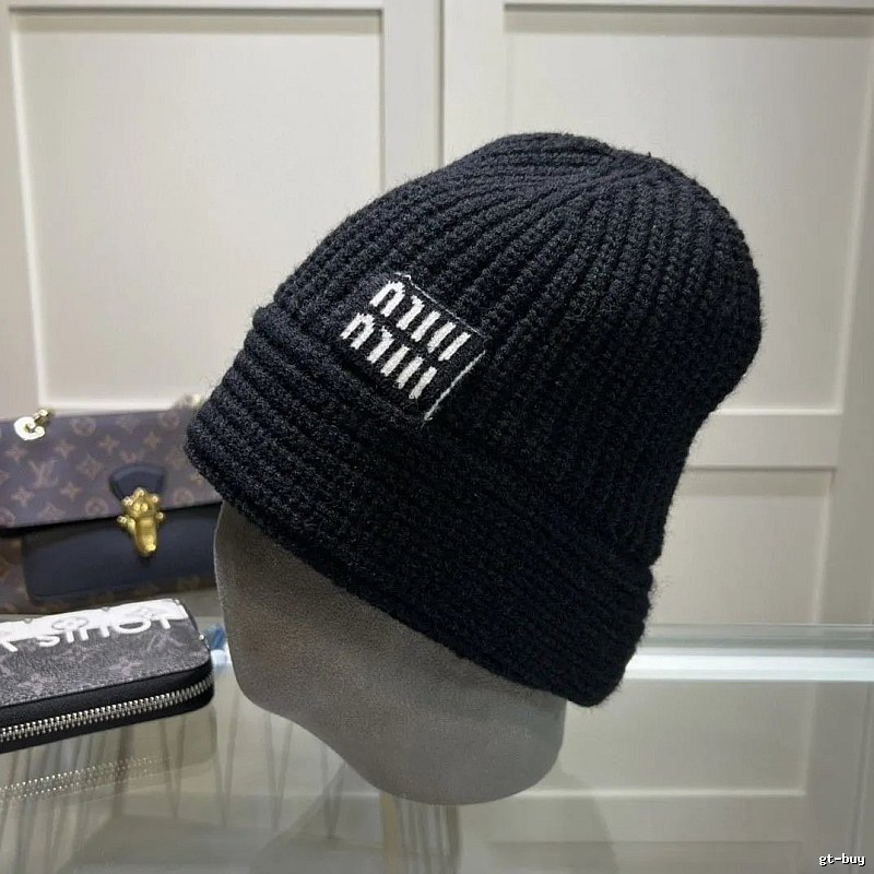 White Miu Miu Ribbed Knit Beanie for Layered Winter Looks